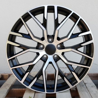 AU1 20x9.0 5x112 +40 66.6 Black Machined Face