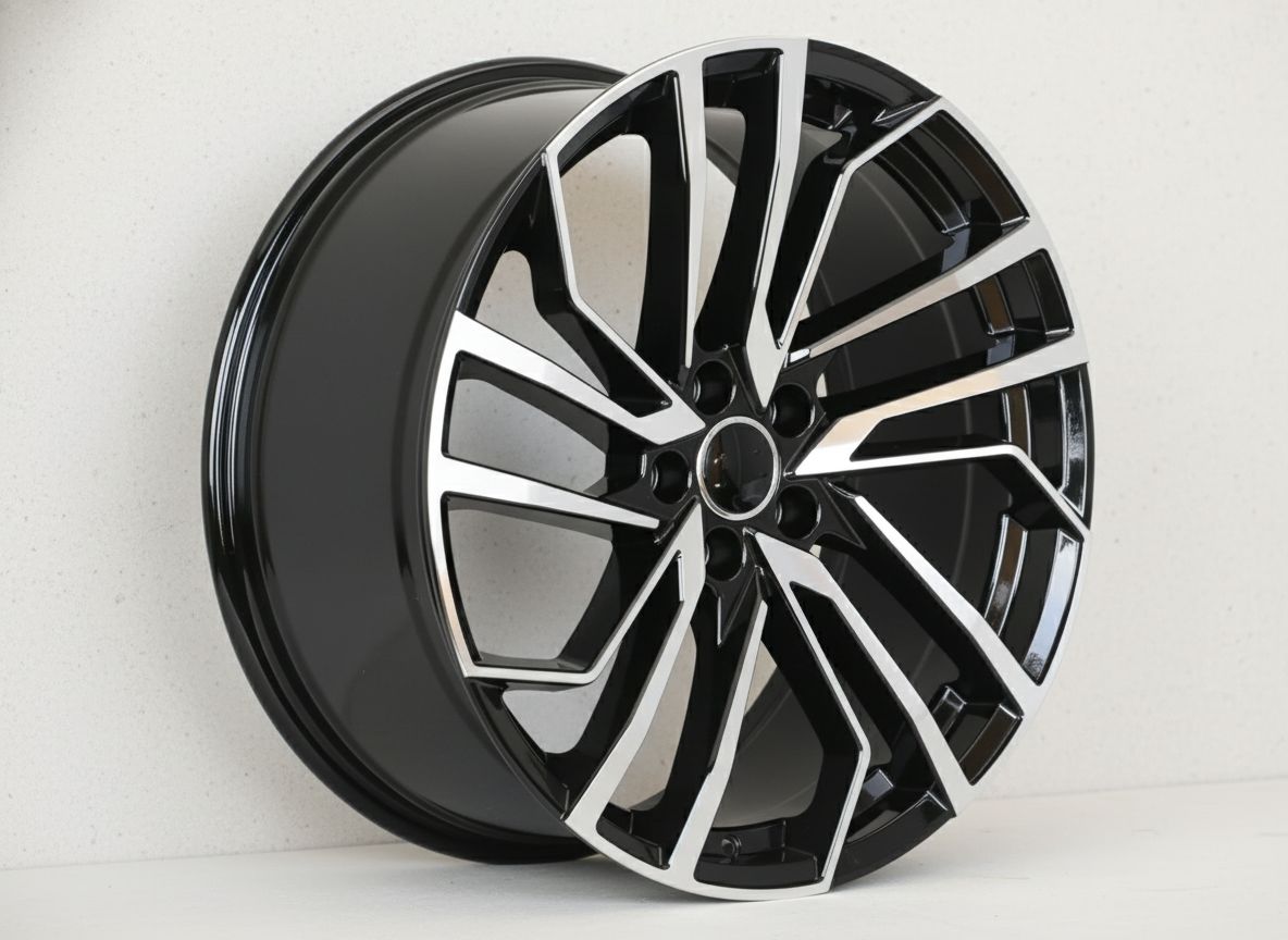 AU15 19x8.5 5x112 +32 66.6 Black Machined Face